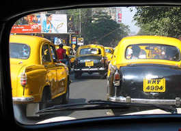 taxis in a busy street in calcutta